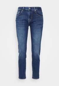 Mörkblå denimjeans, rak bendesign, fem fickor, enkel knappstängning, blekt utseende med subtila slitningar runt höfterna.