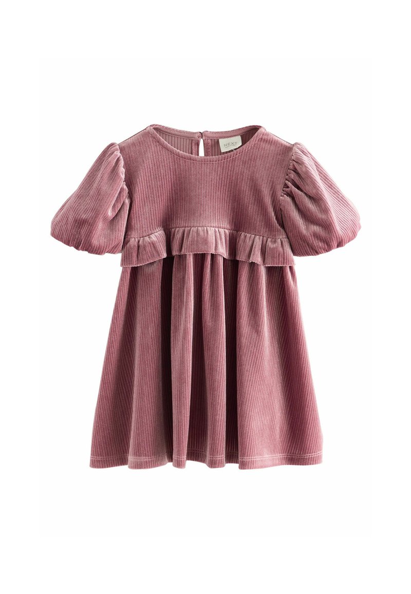 Vestito in velluto corduroy rosa con maniche a palloncino, scollatura rotonda e vita arricciata. Chiusura sul retro con bottoni e tessuto morbido e testurizzato.