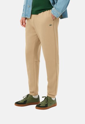 Pantalones deportivos - beige