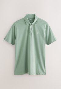Lysegrøn slim fit kortærmet polo-shirt med krave og to knapper, med lille broderet logo på venstre bryst.