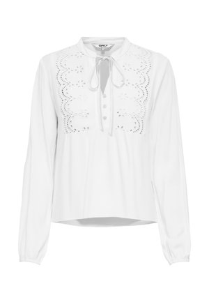 Blouse blanche à manches longues avec des détails en dentelle ajourée sur le devant, un col rond avec une fermeture à nouer et trois boutons sous le col.