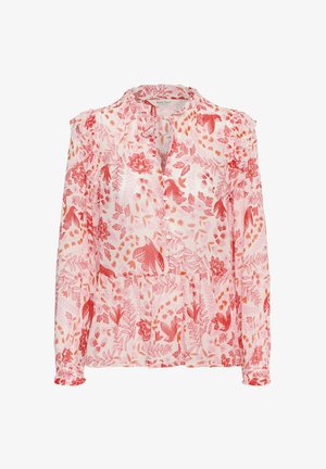 Blouse à manches longues avec boutons et détails à volants, présentant des motifs floraux roses et rouges ainsi que des oiseaux sur un fond blanc.