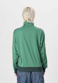 adidas Originals FIREBIRD - Training jacket - preloved green