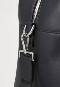Tommy Hilfiger DUFFLE UNISEX - Weekendveske - black