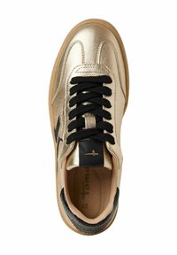 Gold metallic sneaker with black laces, textured black heel, and rubber sole. Features stitched lines and a logo on the tongue.