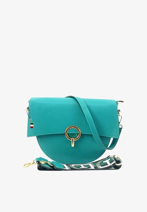 Tälerne Ledertasche mit rundem Boden, Klappenverschluss, goldenen Beschlägen und verstellbarem Tragegurt mit grafischem Muster.