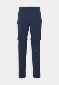 Mörkblå konvertibla vandringsbyxor med avtagbara ben, visade bakifrån mot en enfärgad vit bakgrund.