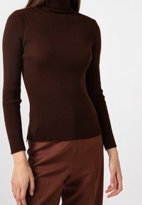 Touché Privé Sweter