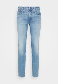 Light blue denim jeans with a straight leg cut, featuring a classic button and zipper closure, five pockets, and slight fading details.