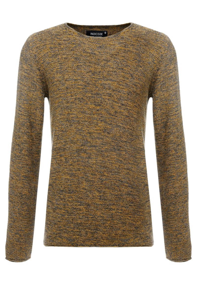 Pull en maille jaune moutarde et gris avec un col rond et des manches longues. Tissu texturé avec un motif subtil.