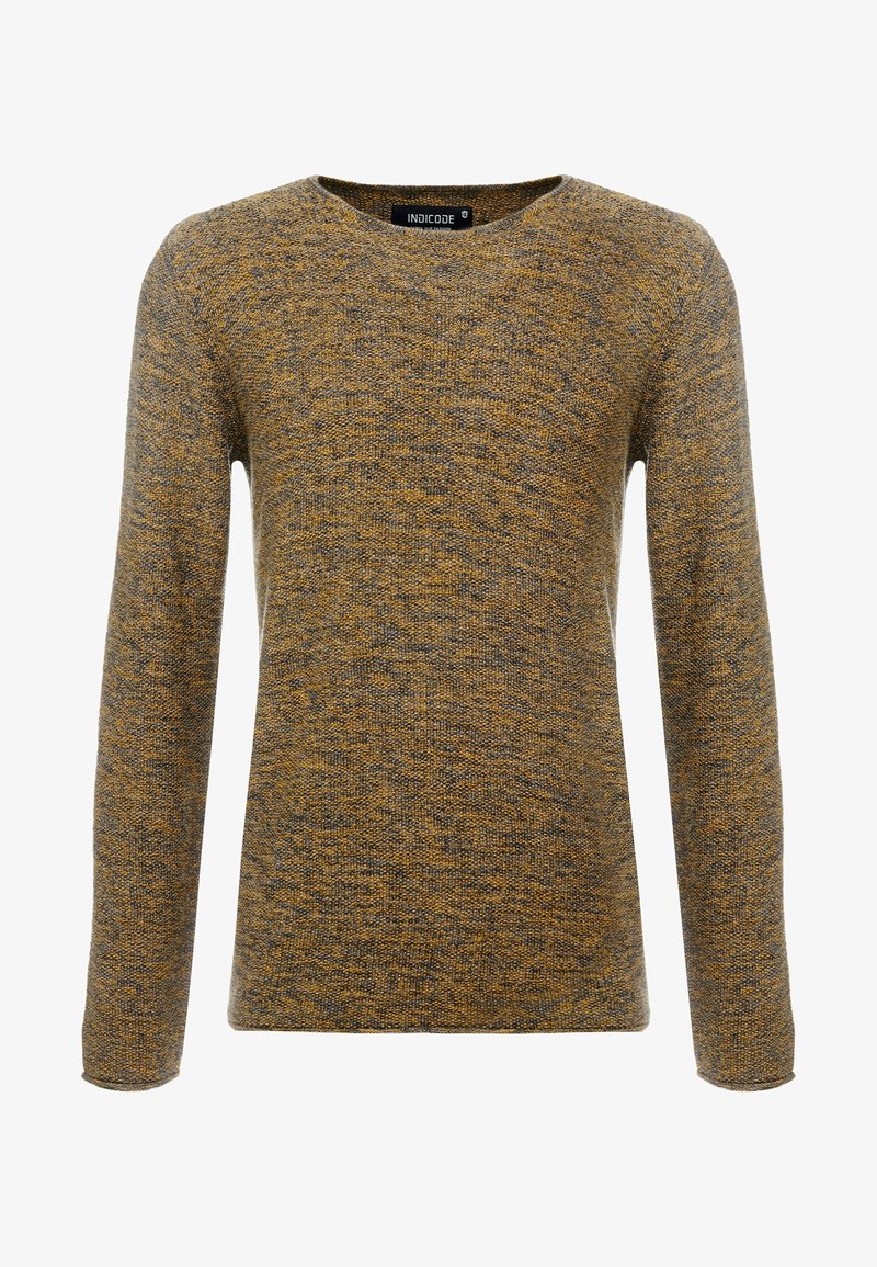 Pull en maille jaune moutarde et gris avec un col rond et des manches longues. Tissu texturé avec un motif subtil.