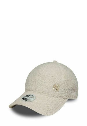 Fleece muts in lichtbeige met een ronde kroon en een gebogen rand. Heeft een gestructureerd oppervlak en een gouden NY-logo aan de voorkant.