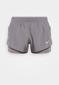 Gray athletic shorts with an elastic waistband, layered design, and a small white Nike logo on the left side. Smooth fabric texture.