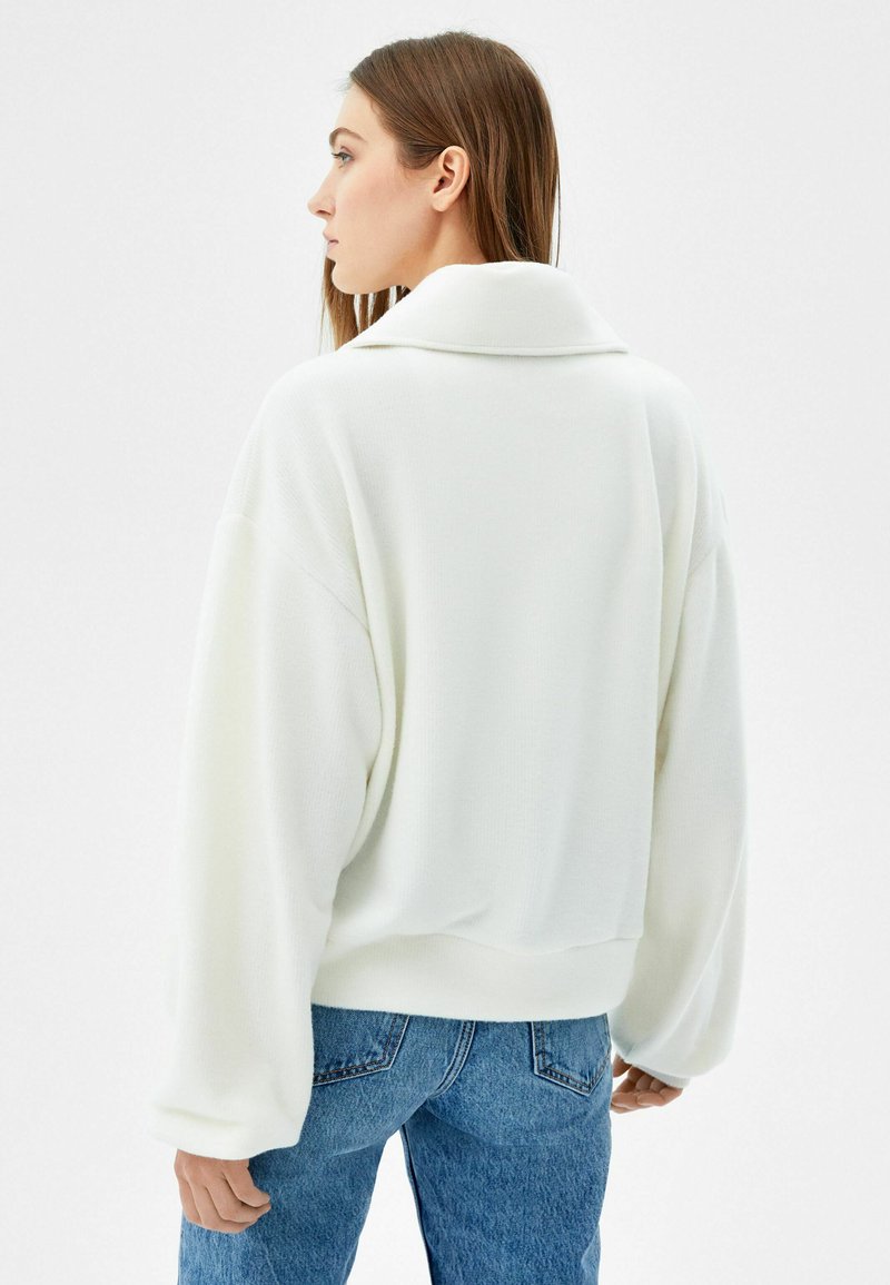 Damen Strickjacken | Bershka ZIPPED NECK Strickpullover off white/offwhite - CX24533 Damen Strickjacken | Bershka ZIPPED NECK Strickpullover off white/offwhite - CX24533