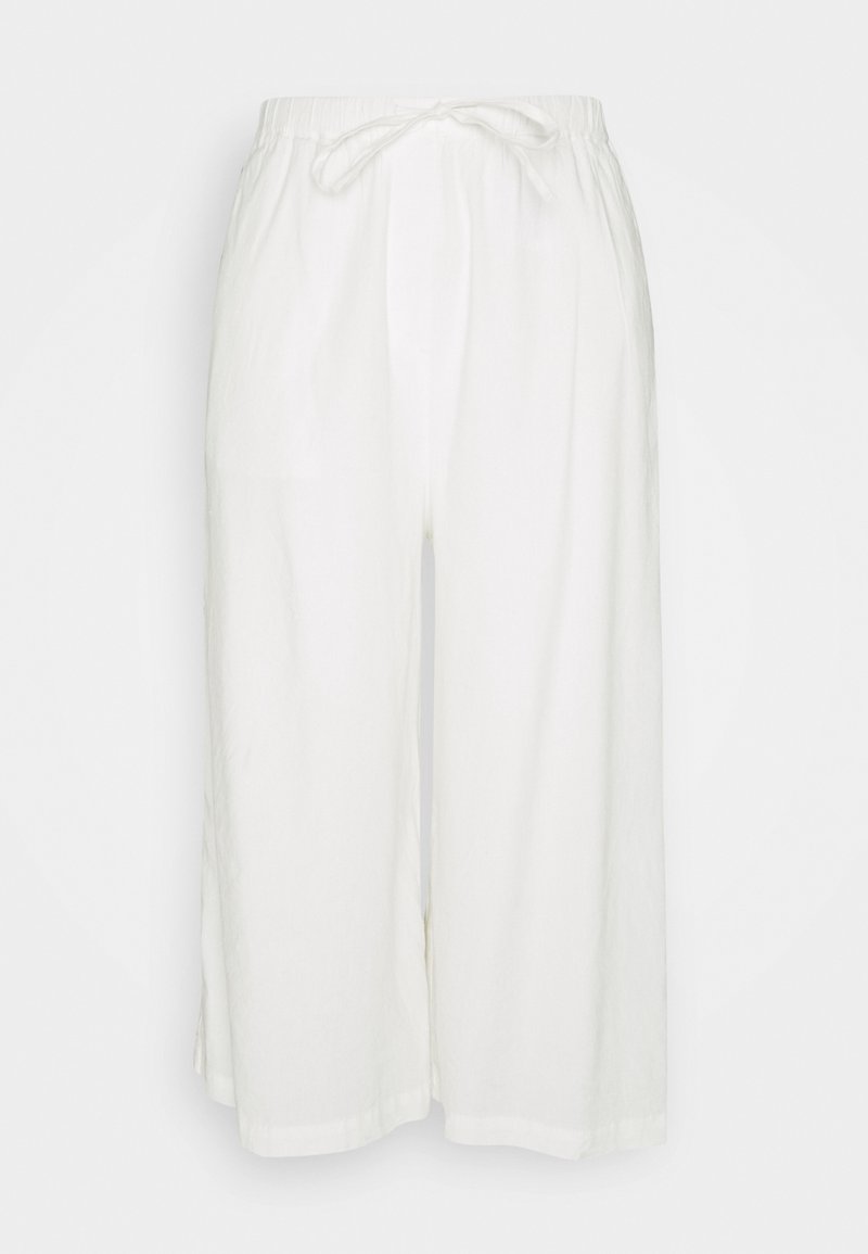 Pantalons culottes blancs, amples, en tissu léger. Caractéristiques : taille élastique avec cordon de serrage et poches latérales.