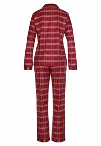 Red plaid pajama set featuring a long-sleeve shirt with a notched collar and matching pants, both with a soft texture and straight leg design.
