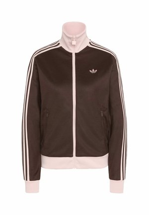 Braune und hellrosa Adidas Trainingsjacke mit durchgehendem Reißverschluss, hohem Kragen, drei Streifen an den Ärmeln und Logo auf der linken Brust.