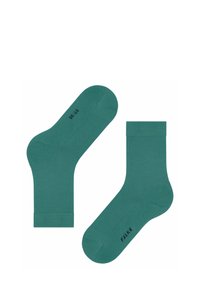Türkise Socken aus glattem Stoff, mit einem gerippten Bündchen, runder Zehenpartie und dezentem schwarzen Branding. Größe 36-38 ist auf der Sohle markiert.