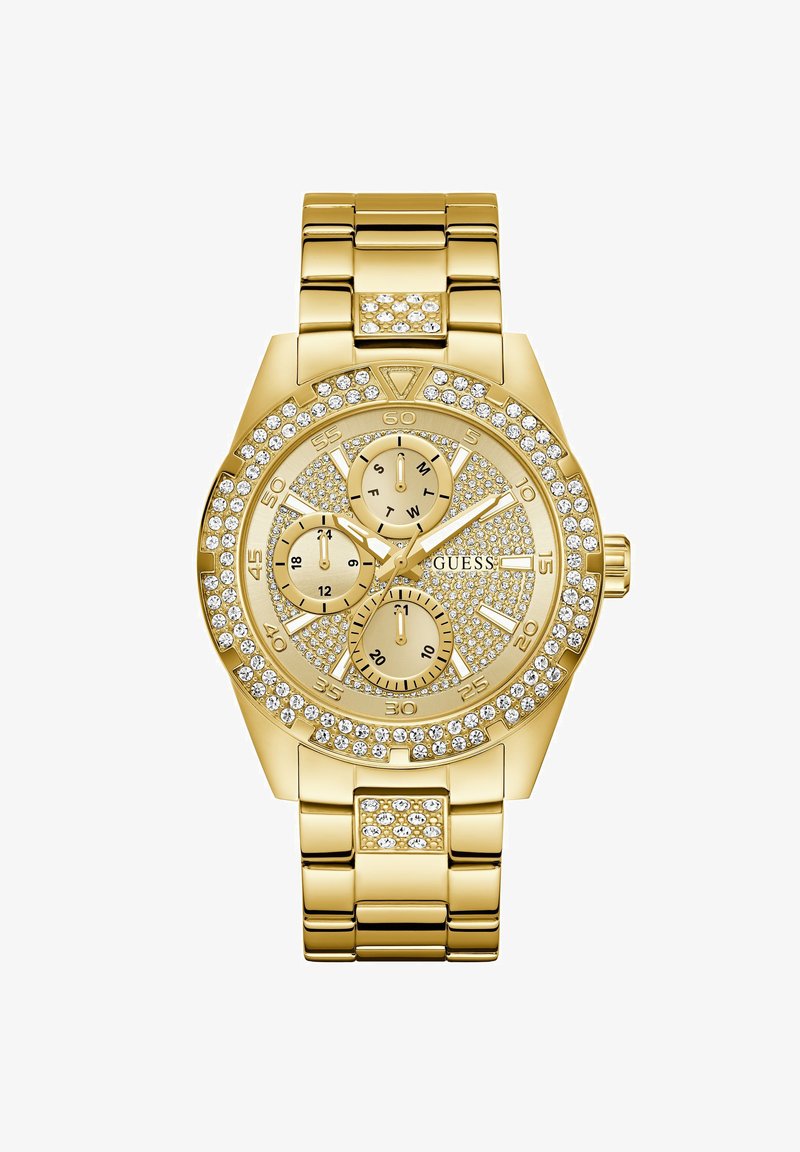 Ρολόι χειρός από μέταλλο σε χρυσή απόχρωση με κρυστάλλινες λεπτομέρειες, τρεις υποκαντράν για ημέρα, 24ωρο και δευτερόλεπτα, και μπρασελέ με συνδεδεμένους κρίκους και διακόσμηση από κρύσταλλα.