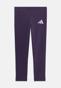 Lila leggings i stretchmaterial, med en figurnära design och en Adidas-logotyp i vitt på övre lår.