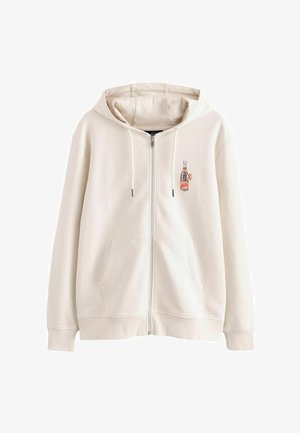 Cremefarvet hættejakke med lynlås, frontlommer, hætte med snore og en lille broderet vintage sodaflaske på venstre bryst.