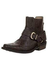 Mörkbrun läderankelboot med sidspänne och remdetalj, strukturerad ovandel och en låg staplad klack. Har sömdekorationer.