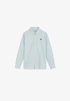 Lyseblå og hvide tynde stribede skjorte med lange ærmer, knapper, krave og lille sort dødningehoved og korsben-logo på venstre bryst.