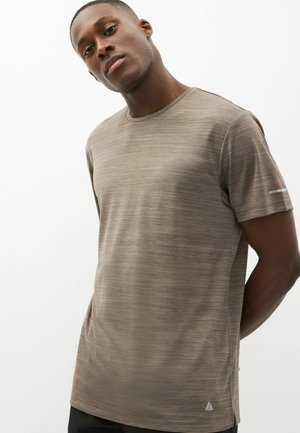 T-Shirt sport - stone cream