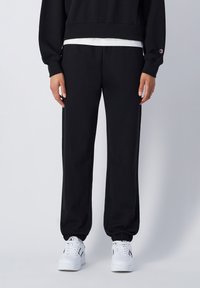 Champion ELASTIC CUFF SCRIPT SHOP - Pantalon de survêtement - black