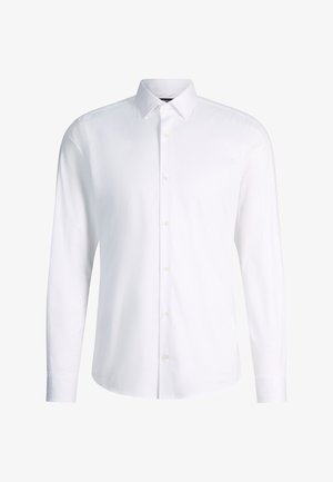 Witte herenoverhemd met lange mouwen, knoopsluiting aan de voorkant en klassieke spitse kraag, getoond op een effen achtergrond.