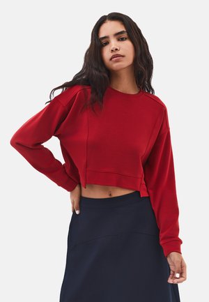 - Bluza