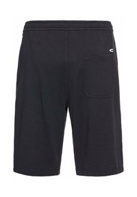 Sorte bomuldsbornshorts med elastisk talje, en baglomme og syet søm. Har et diskret logo på bagsiden.