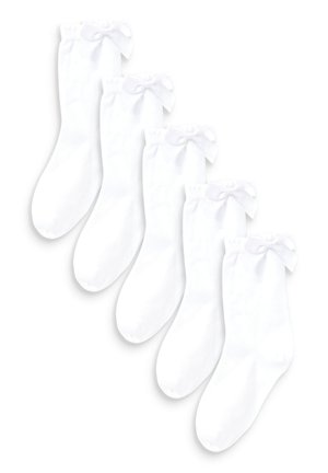 Witte enkelhoge sokken van een zacht materiaal, met een decoratieve strik bij de boord. Set van vijf paar. Gladde textuur.