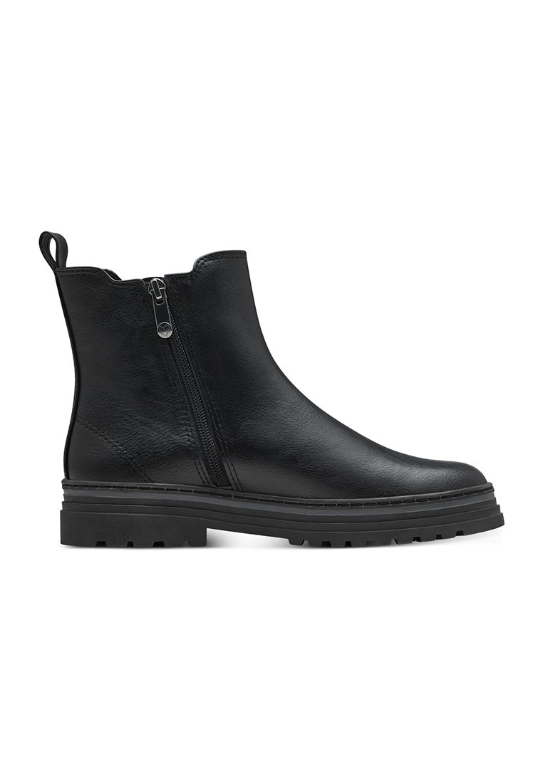 Bottine en cuir noir avec fermeture éclair sur le côté, tirette au niveau du talon, semelle crantée et bord supérieur légèrement festonné.
