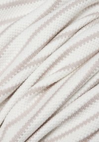 White and beige striped textile, soft texture, woven pattern, featuring alternating bands of solid and textured stripes.