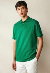 Next REGULAR - Poloshirts - green tennis