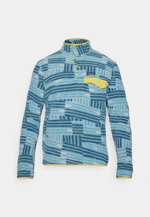 Fleece pullover in varying blue stripes and patterns. Features a yellow collar and pocket. Buttoned neck with a label on the chest.