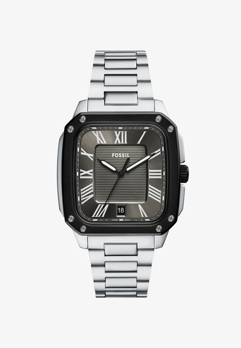 Square Fossil watch with a silver metal bracelet. Dark gray textured dial with white Roman numerals, silver hands, and a date display. Black case.