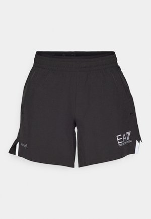 Zwarte sportieve shorts met een elastische tailleband, zijzakken en witte logo-accenten. Heeft een gesplitste zoomontwerp voor meer bewegingsvrijheid.