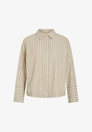 Svītraina krekls gaiši bēšā krāsā ar plānām brūnām vertikālām svītrām. Tam ir klasisks apkaklis, pogu aizdare un trīs ceturtdaļu garuma piedurknes ar svītrainiem aproču maliņām.