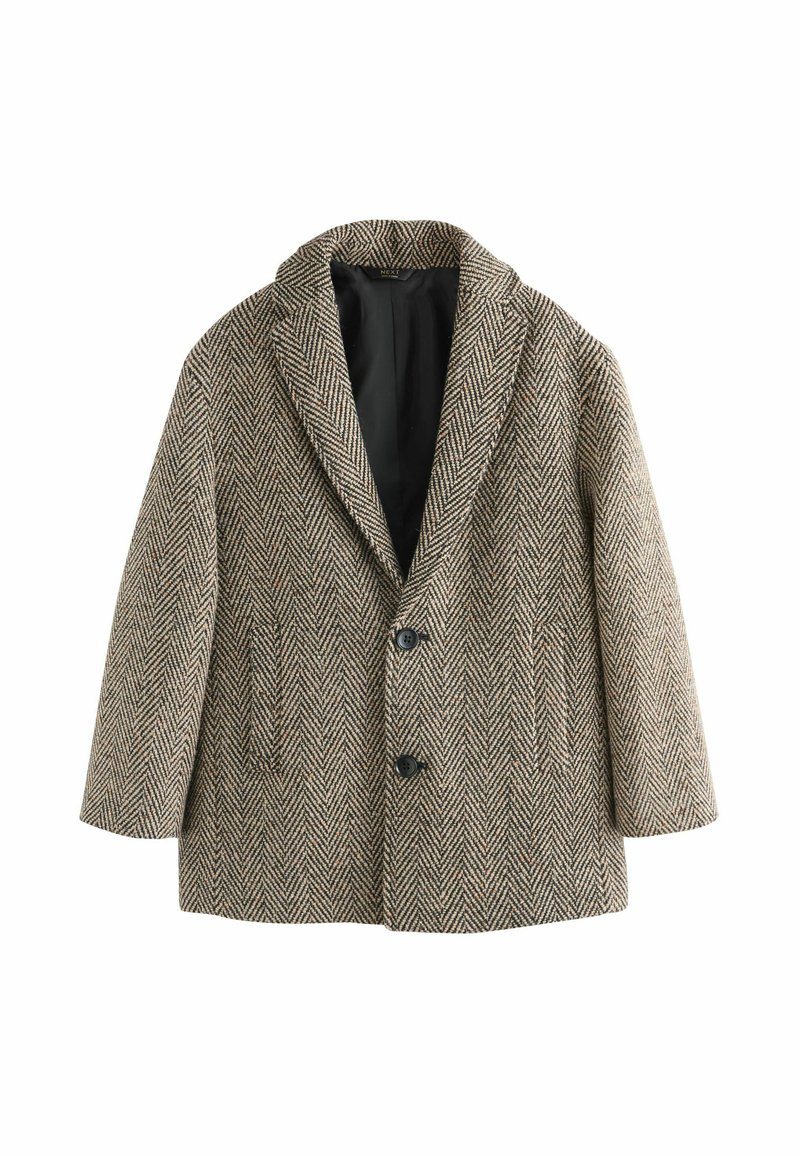 Brun frakk i herringbone-mønster med notch-lapel, dobbeltknapper og sidelommer. Tekstureret uldmateriale og sort foer.
