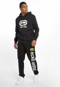 ecko unltd. URBAN CLASSICS 2FACE  - Træningsbukser - black green