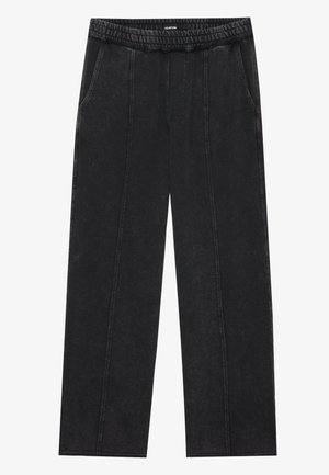 Svarte vid leggebukser med elastisk midje, med en glatt denimtekstur og subtile sømdetaljer foran.
