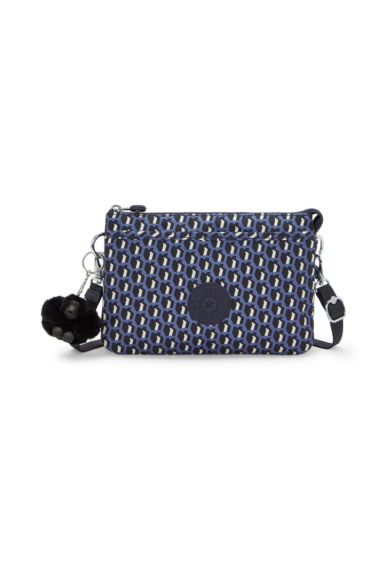 Borsa a tracolla a fantasia navy con tessuto testurizzato, chiusura con zipper, tracolla staccabile e un charm a pom-pom nero attaccato.