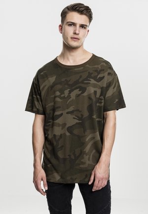 Olive green camouflage T-shirt made of soft fabric, featuring a loose fit, round neckline, and short sleeves.