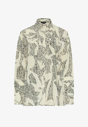 Koszula z długim rękawem w kolorze kremowym z czarnym abstrakcyjnym wzorem, z guzikami z przodu i lekko luźnym krojem. Materiał ma gładką teksturę.