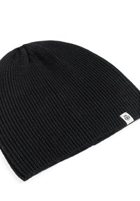Black ribbed knit beanie hat with a rounded top and a small, white branded tag at the bottom edge. Soft texture and stretchy material.