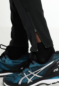 Salomon Trikoot - black