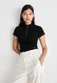 Calvin Klein Jeans VARIEGATED HALF ZIP - Basic póló - black