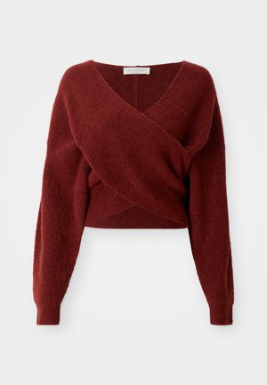 Burgundy cropped sweater with a fuzzy texture, featuring a deep V-neckline and long sleeves, designed with a wrapped style.